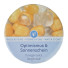 Cardboard box containing orange calcite and rock crystal gemstones for revitalizing drinking water.
